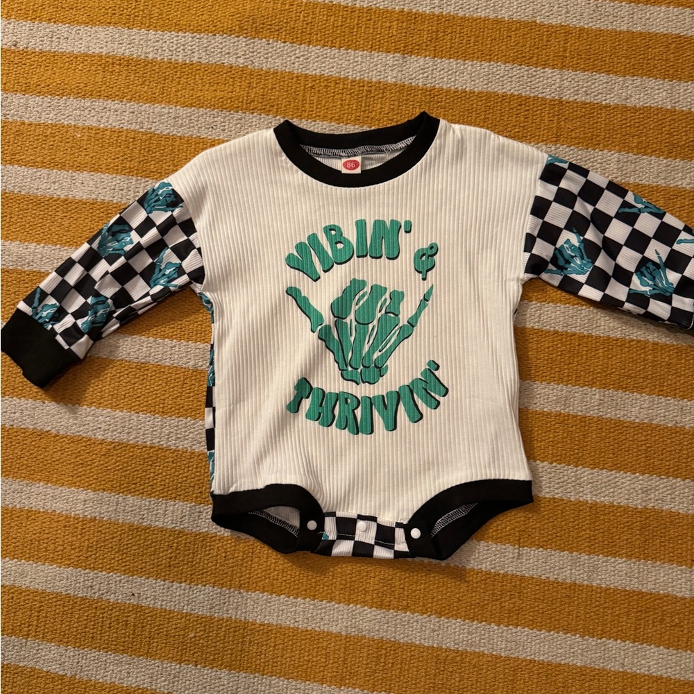 Long sleeve baby top size for 12 to 18 months skeleton checker board ribbed